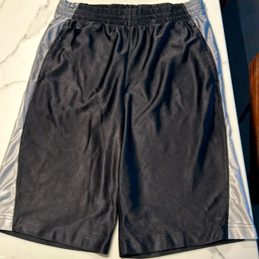 14/16 pairs of shorts, comes in black or blue